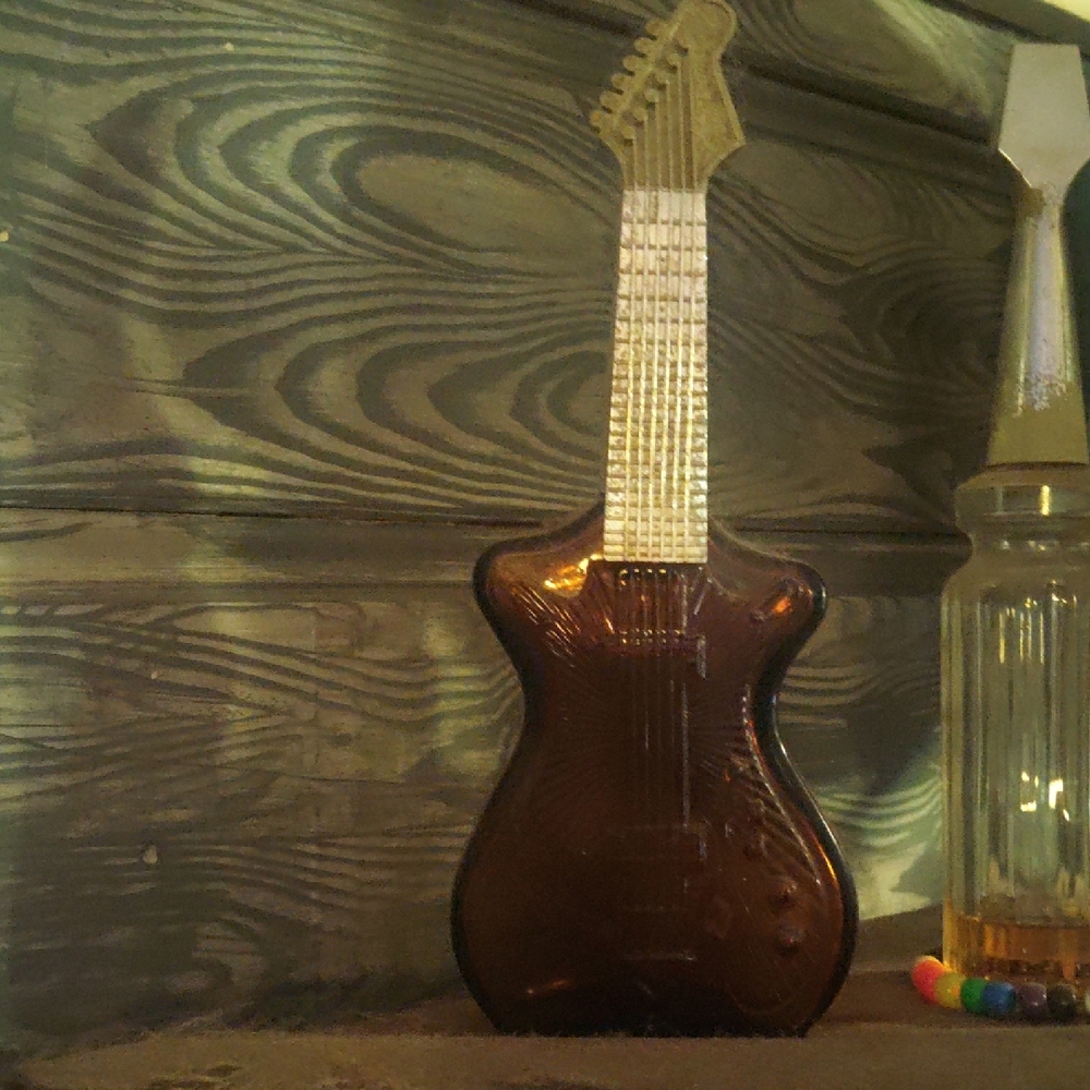 Avon Brown Guitar Shaped Bottle